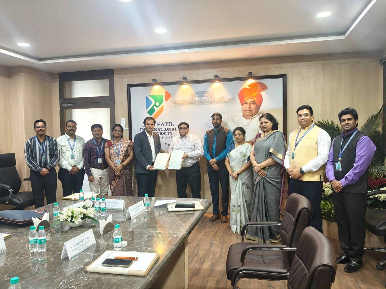 MoU Signing Ceremony between D YPatil international University and Techovedas.